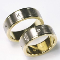  Two-tone wedding rings, 750 yellow and white gold, brilliant
