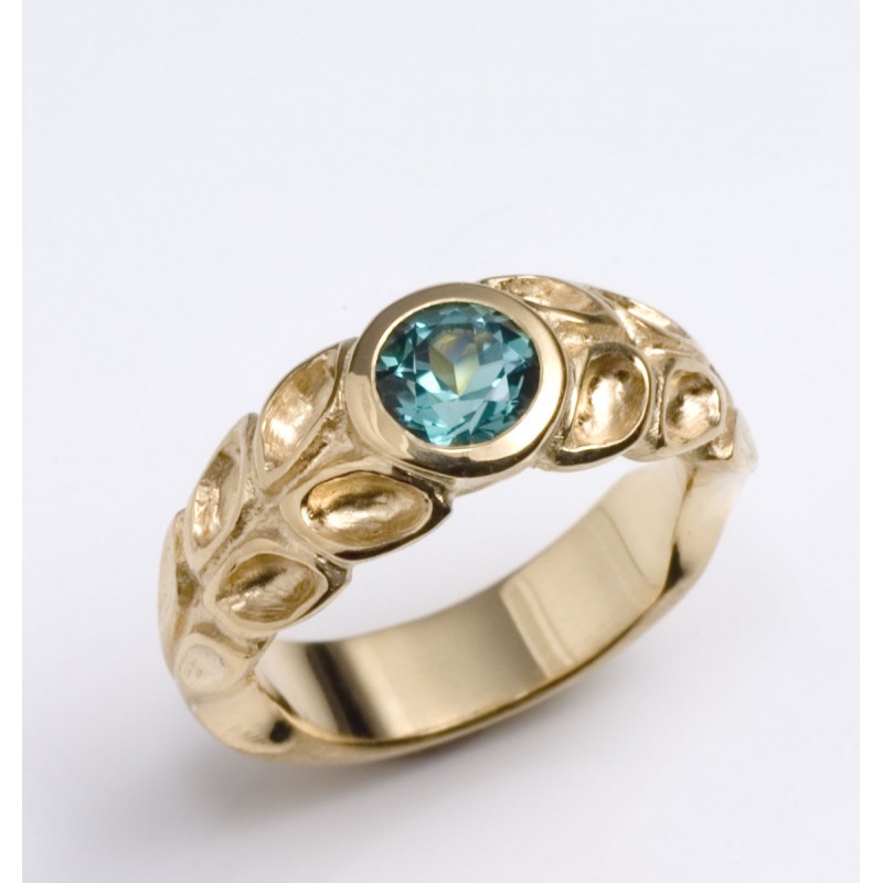 Golden tourmaline ring with green-blue tourmaline Golden tourmaline ring with green-blue tourmaline